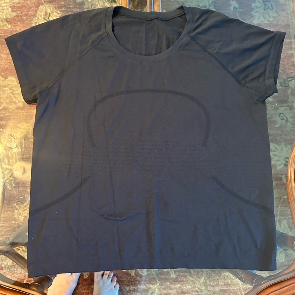 Black lululemon swiftly tech race length shirt size 16